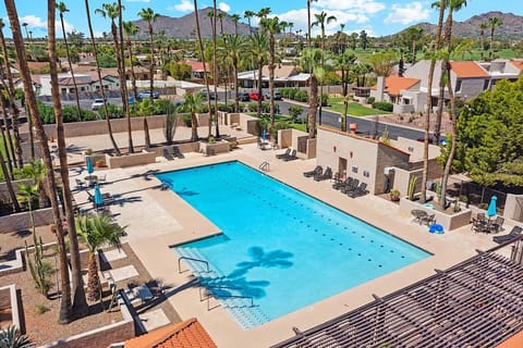 The well-kept community keeps loungers, pool umbrellas, and some bistro tables (first come, first serve)