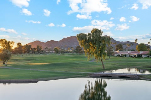 Watch the sunset over the mountain from your balcony