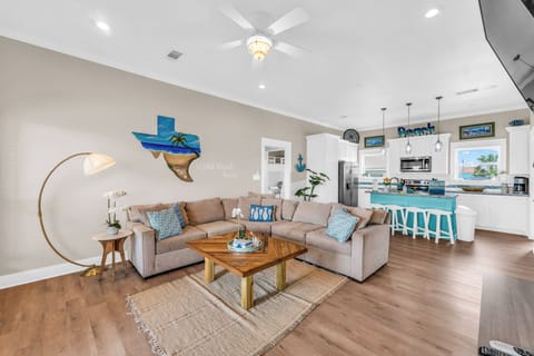 Relax in the living room on the comfortable couch while enjoying your favorite shows (1)