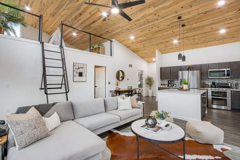16ft tall ceilings w/ Blue Stained Pine make the home feel light and airy.