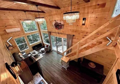 Looking down from the loft onto the bright, open living room—your cozy home base after a day of exploring the Gorge.