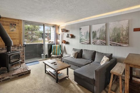 Living room, with wood burning stove, deck