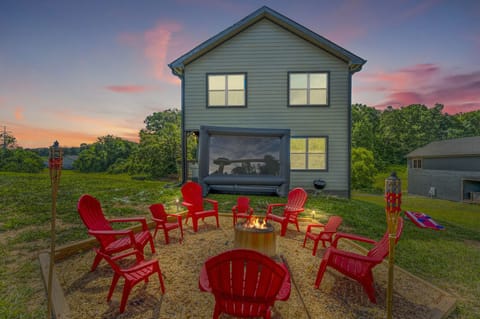 Cozy up by the crackling flames of our outdoor fireplace. Warmth, ambiance, and starlit conversations await