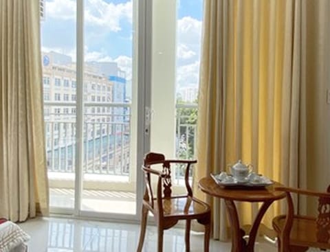 Presidential Condo, Multiple Beds, Bathtub, City View | Living area | LCD TV