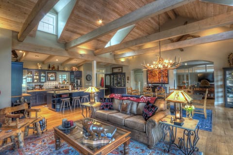 Main Living and Dining Spaces and Kitchen - Deck access and wood burning fireplace