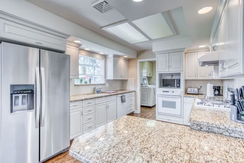 Imagine preparing meals in this brilliant, functional kitchen.