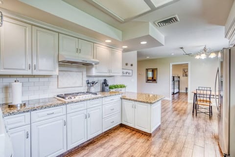 Inspire delightful meals and lively connection in your radiant kitchen.