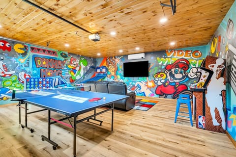 A 500sf game room keeps the whole group entertained when at the cabin. 