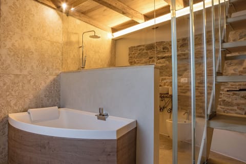 Luxury Room | Bathroom | Designer toiletries, hair dryer, bathrobes, slippers