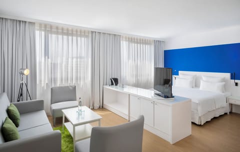 Hypo-allergenic bedding, blackout drapes, iron/ironing board, bed sheets