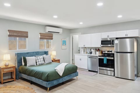 Closer view of the bed/kitchen