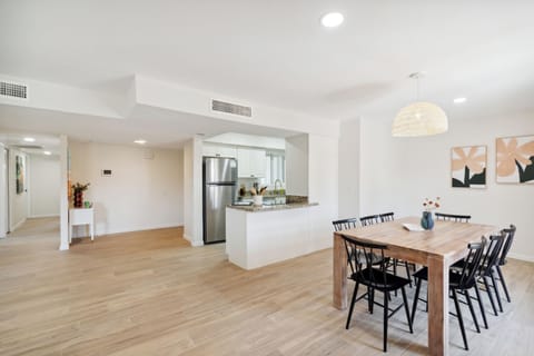 View of the kitchen and dining from the back door.