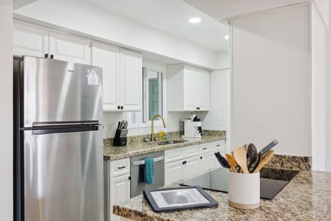Save money by cooking meals in this fully stocked and kitchen.  All of the appliances are brand new stainless steel in 2023.