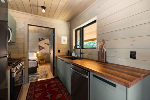 Fully equipped kitchen includes a dishwasher.