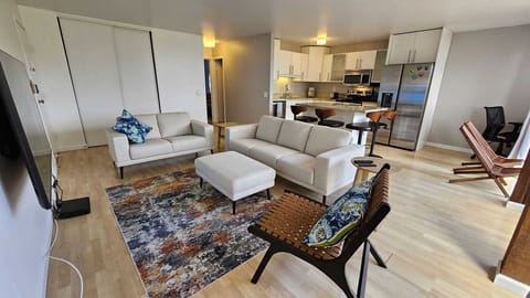 Living Room, Sofa, Love Seat, Chair, 65" Samsung 4K Smart TV. Wifi up to 500mbps