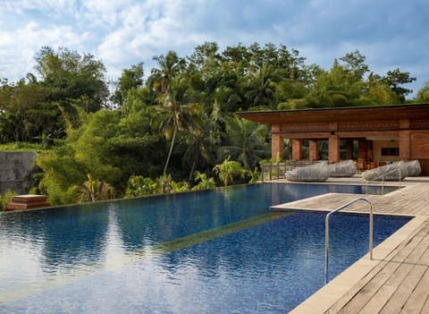 Outdoor pool, pool umbrellas, sun loungers