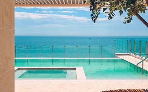 Outdoor pool, open 9:00 AM to 9:00 PM, pool umbrellas, sun loungers
