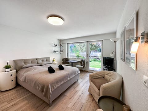 Lovely view from the studio with a large, comfortable double bed (160x200cm).