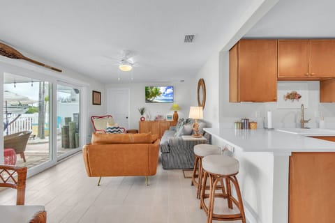 Breakfast bar with open layout from the dining room to the living room.