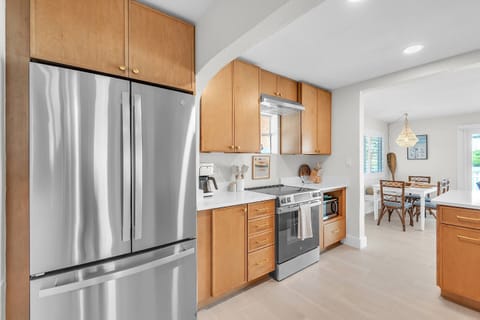 Large stainless steel fridge to fit all your food and drinks.