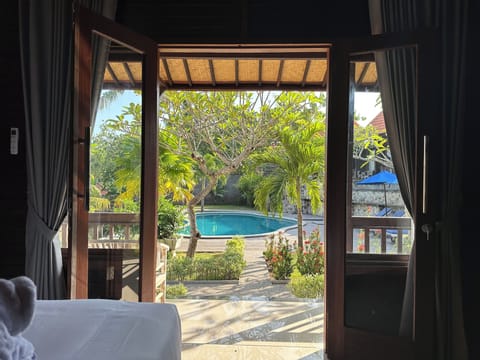 Deluxe Room, Pool View | 1 bedroom, Egyptian cotton sheets, premium bedding, pillowtop beds