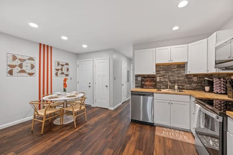 Modern kitchen and dining area.