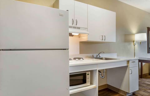 Studio, 1 Queen Bed, Accessible, Non Smoking | Private kitchen | Fridge, microwave, stovetop, coffee/tea maker