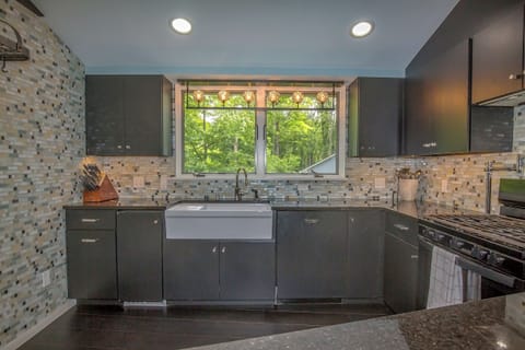 Kitchen is roomy and has wonderful view of front gardens