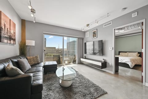 Spacious living room with 65" Smart tv
