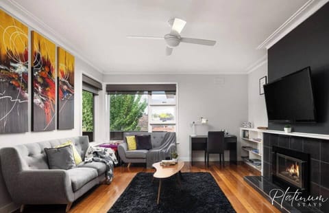 Soak up the sunshine in this bright, cosy lounge with a crackling fireplace.
