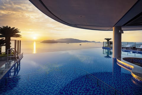 Outdoor pool, open 6:00 AM to 7:00 PM, pool umbrellas, sun loungers