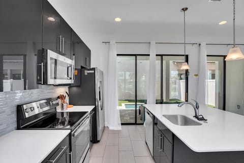 Natural light floods into the living space through the large patio doors.