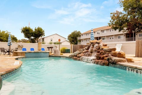 Escape to paradise and take a refreshing dip in one of the two community pools with a captivating rock waterfall feature at Waterwheel.