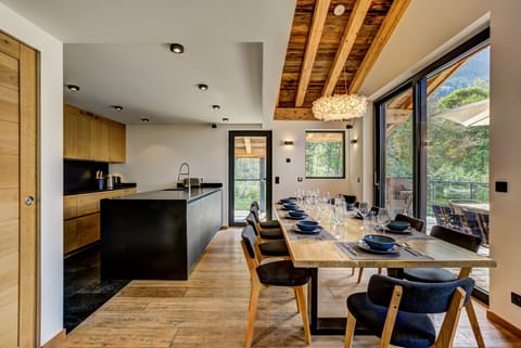 Kitchen with stone worktops and walk-in pantry