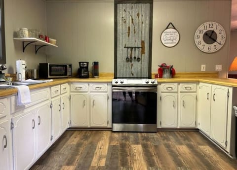 The cabin is beautifully surrounded by trees and is a nature retreat. -Stephanie