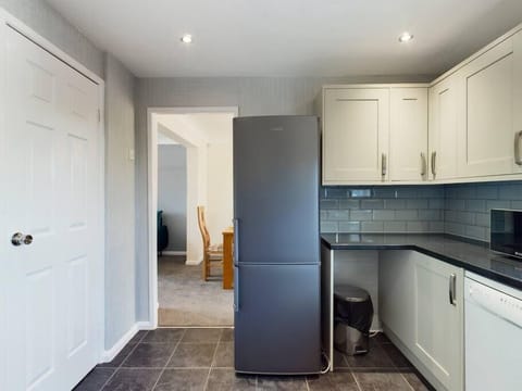 Kitchen facing towards dining room.