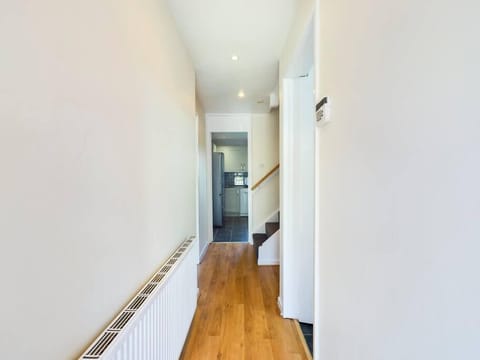 Corridoor- leading to living room and kitchen .