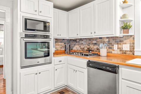 Share cooking and dining moments in a fully equipped, inviting kitchen.
