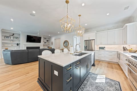 The gourmet kitchen with large center island