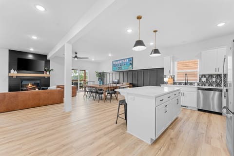 The first floor features an open floor plan that invites conversation and connection.