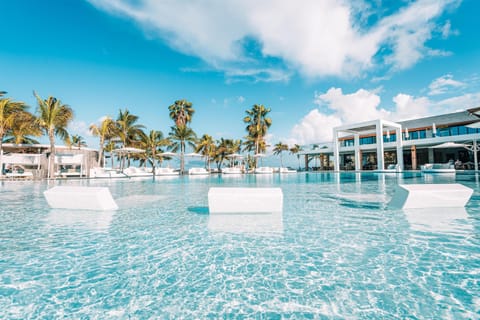 3 outdoor pools, open 8:00 AM to 8:00 PM, pool umbrellas, sun loungers