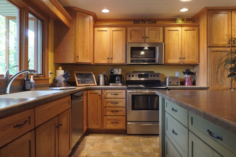 Full Kitchen with Coffee & Grinder, Kettle, Toaster, Blender, & more.