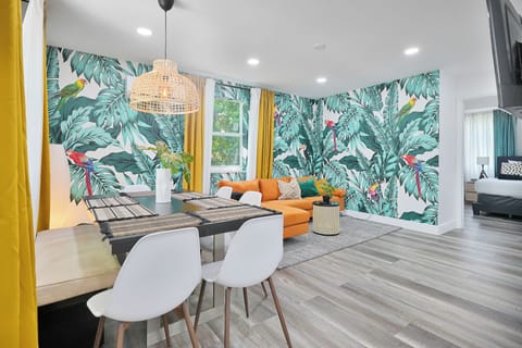 Comfort Apartment | Living area | 50-inch Smart TV with cable channels, streaming services