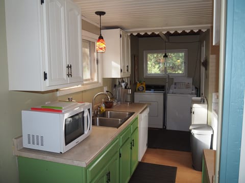 KITCHEN: The chalet has a full kitchen with all appliances including a dishwasher. It also has a good supply of cooking and dining utensils.
