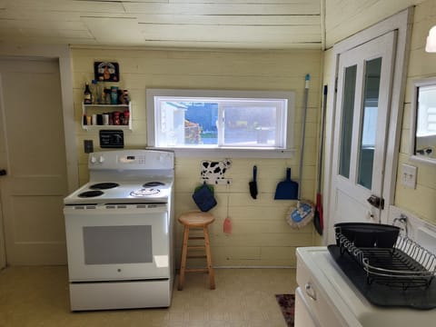 KITCHEN: The home has a large kitchen with all appliances, except for a dishwasher.