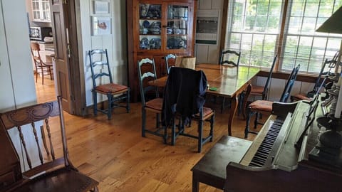 DINING AREA:  There is a lovely dining area with a table and chairs for 6 adults.  (It might be possible to squeeze in 8 adults if needed.)