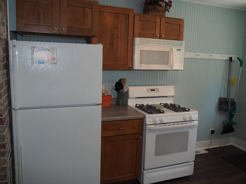 KITCHEN:  The apartment has a full kitchen with all appliances including a dishwasher.