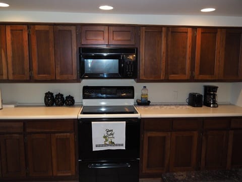 KITCHEN:  Large kitchen with all appliances including a microwave and dishwasher.
