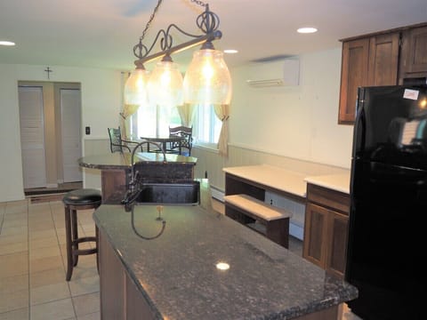 KITCHEN:  Large kitchen with all appliances including a microwave and dishwasher.