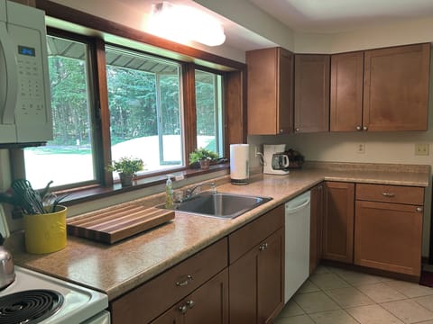 KITCHEN: The cabin has a full kitchen with all appliances including a dishwasher.